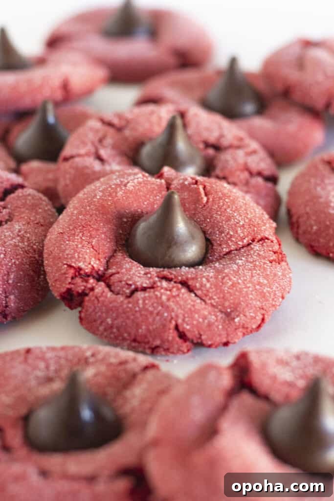 Red Velvet Kiss Cookies on a white tray.