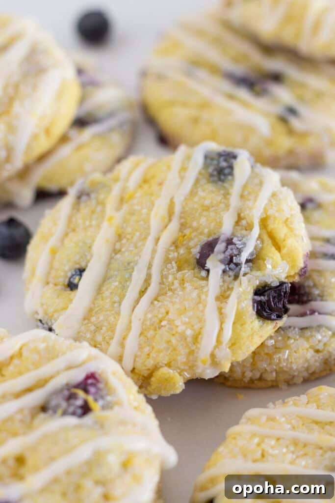 Lemon blueberry cake mix cookies with lemon glaze.