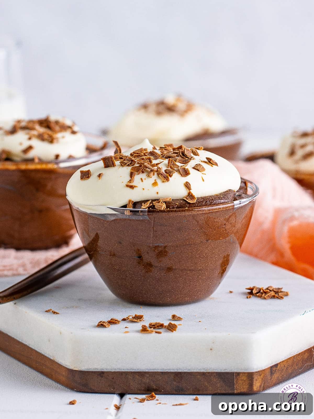 Decadent Chocolate Mousse Recipe You Can Make Tonight 2 Chocolate mousse in glass cup topped with whipped cream.