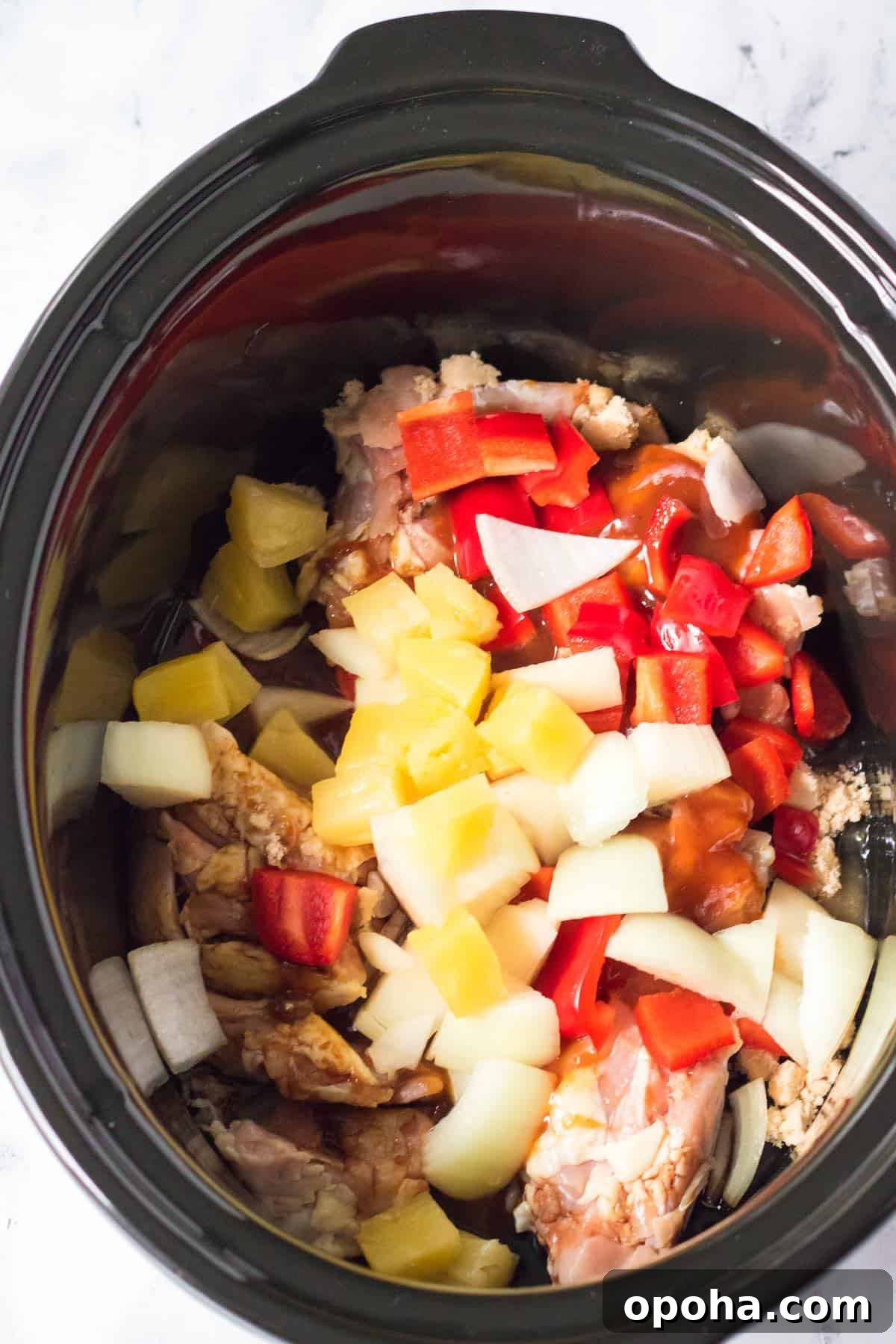 Slow Cooker Hawaiian Chicken with Pineapple and Sticky Sauce 4 Ingredients to make crockpot Hawaiian chicken in a slow cooker.
