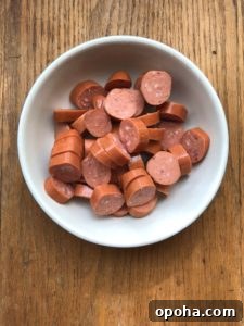Meat lovers pasta ingredient sliced link sausage