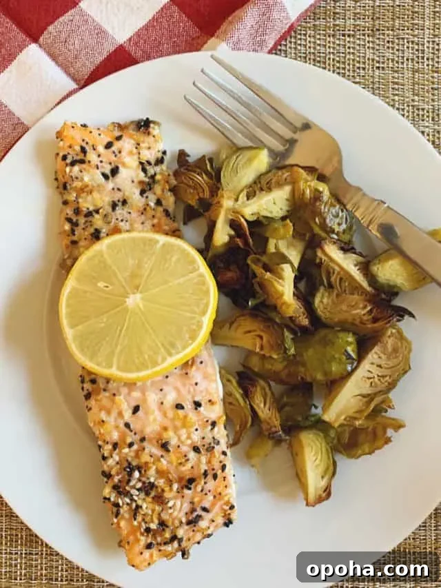 plate of salmon with butter and everything seasoning