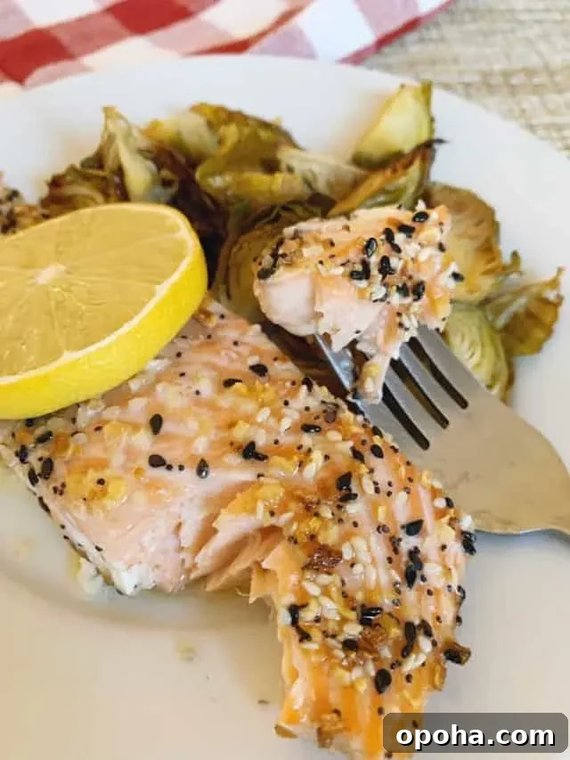 bite of baked keto salmon