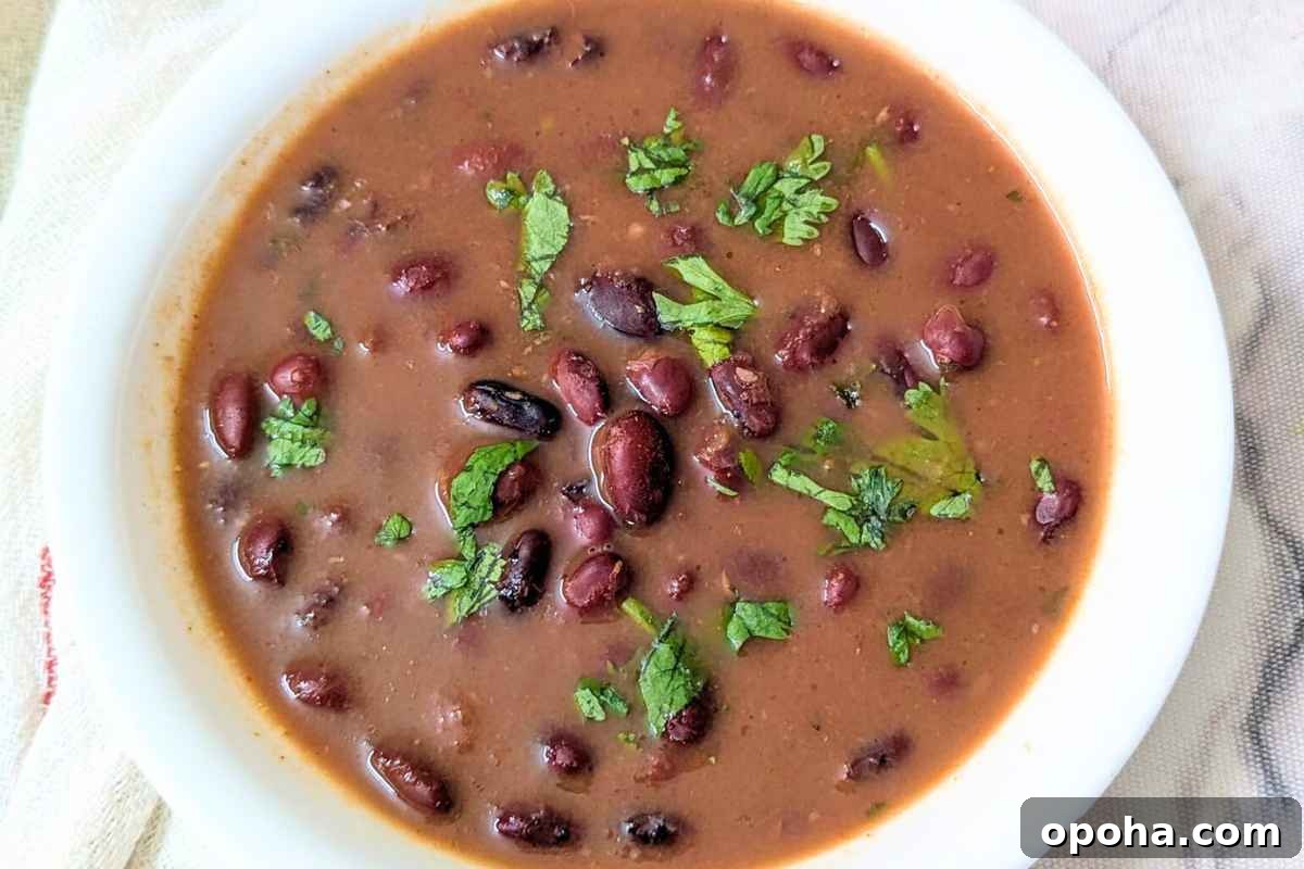 15 Classic Indian Vegetarian Recipes That Always Impress 10 Tasty rajma masala served in a bowl.