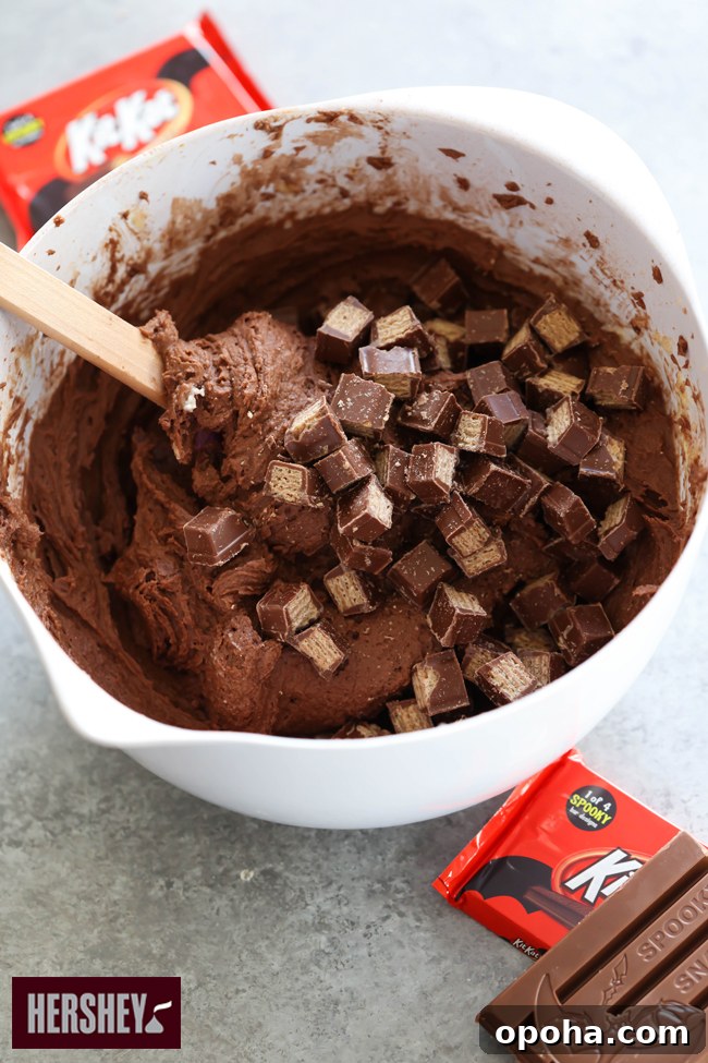 Kit Kat Halloween Brownies Recipe — Spooky Candy Bar Brownies 4 Stacked KIT KAT Halloween Brownies with malted buttercream