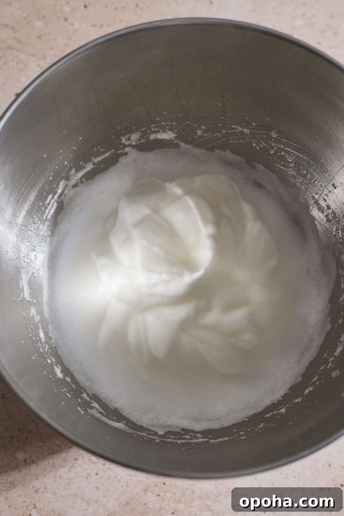 Decadent Dairy-Free Chocolate Mousse Recipe 6 Whipped egg whites in a large bowl.