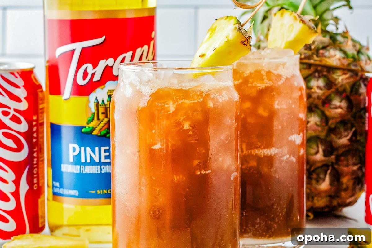 Swig Waikiki Drink Recipe — Copycat Sparkling Island Mocktail 3 Two Swig Waikiki drinks on a counter.