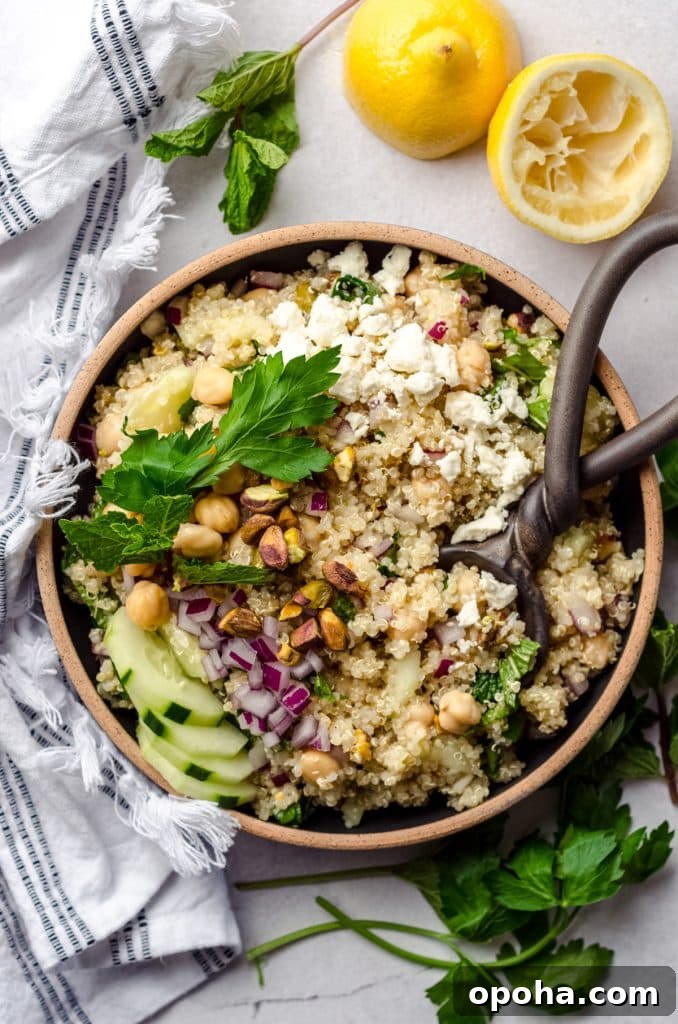 Apple Quinoa Granola Recipe: Crunchy Baked Apple Quinoa Clusters 10 aerial photo of Jennifer Aniston salad in a bowl with a serving spoon