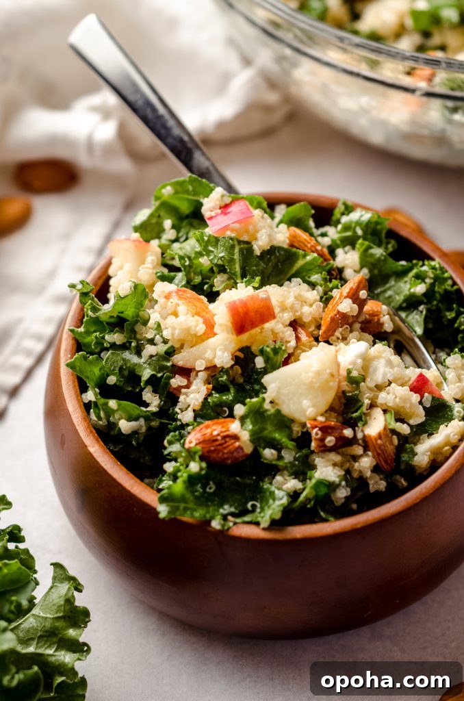 Apple Quinoa Granola Recipe: Crunchy Baked Apple Quinoa Clusters 7 apple, quinoa, and almond kale salad in a bowl