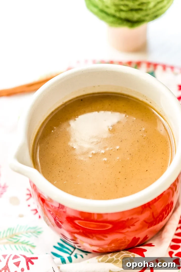 Warm spiced vanilla syrup in a saucepan