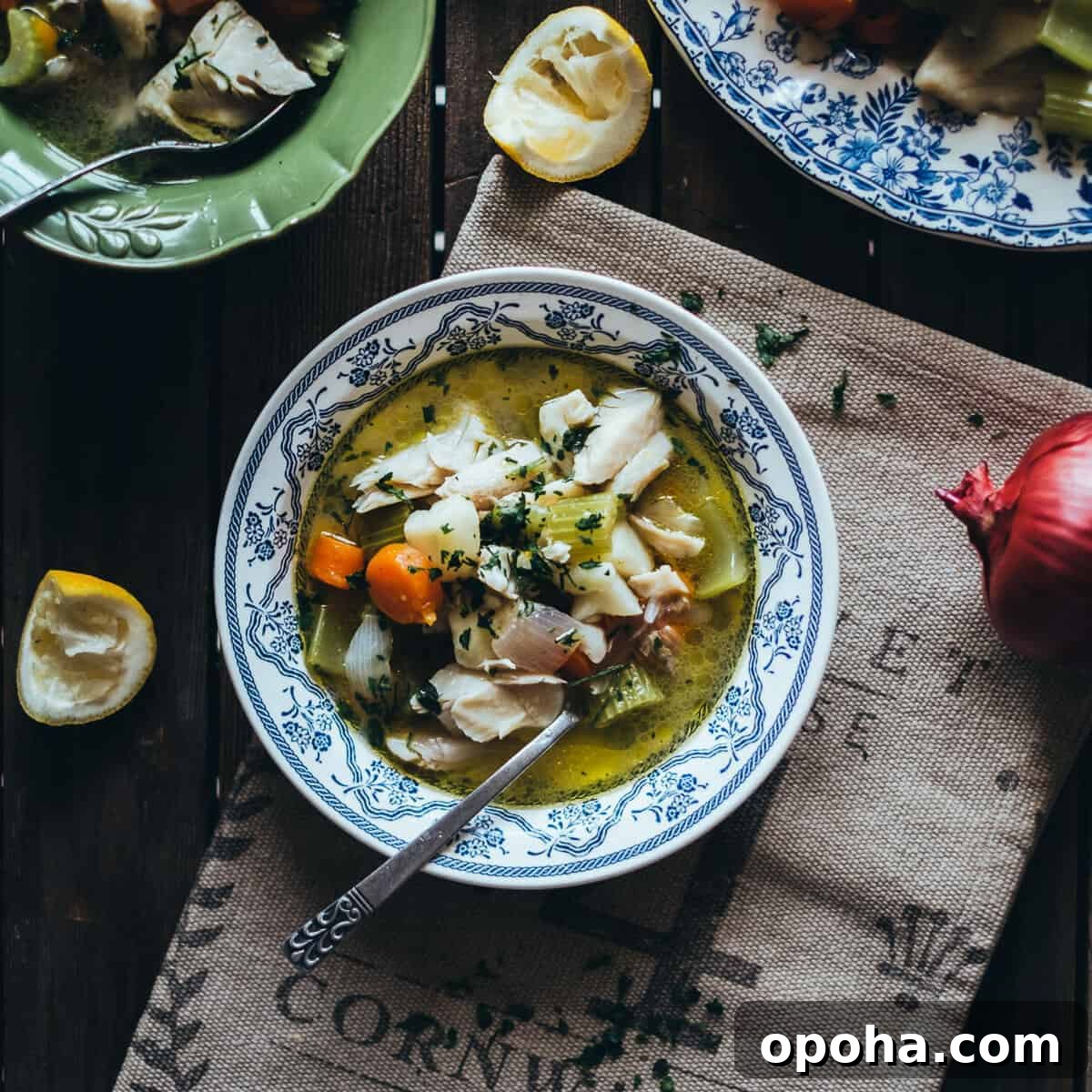 fish and vegetable soup served in a bowl