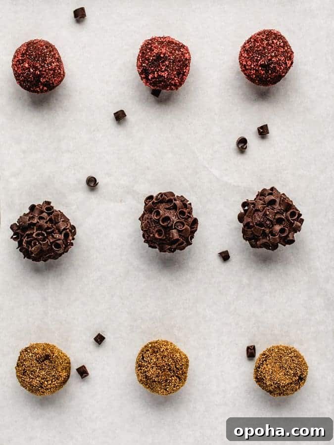 Chocolate Pumpkin Truffles Recipe — Rich, No-Bake Fall Treat 3 Overhead image of tray of chocolate pumpkin truffles with chocolate curls
