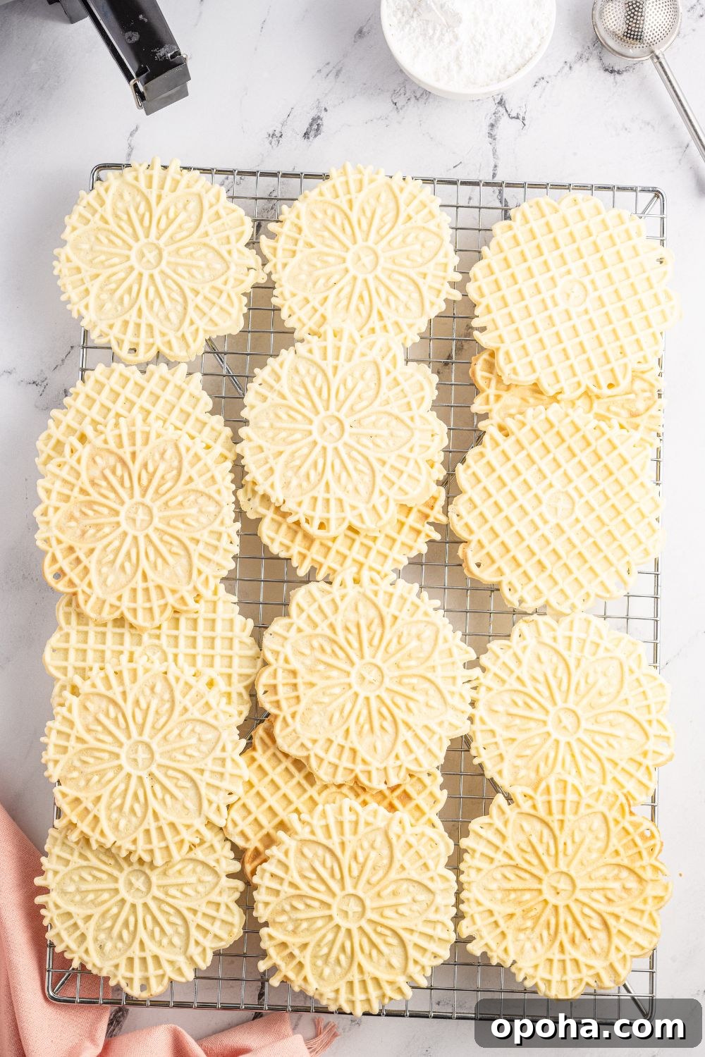 Traditional Italian Pizzelle Cookies: Crisp Anise Wafers Recipe 15 Pizzelles on a cookie tray