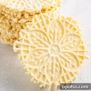 Traditional Italian Pizzelle Cookies: Crisp Anise Wafers Recipe 27 Pizzelles on marble table