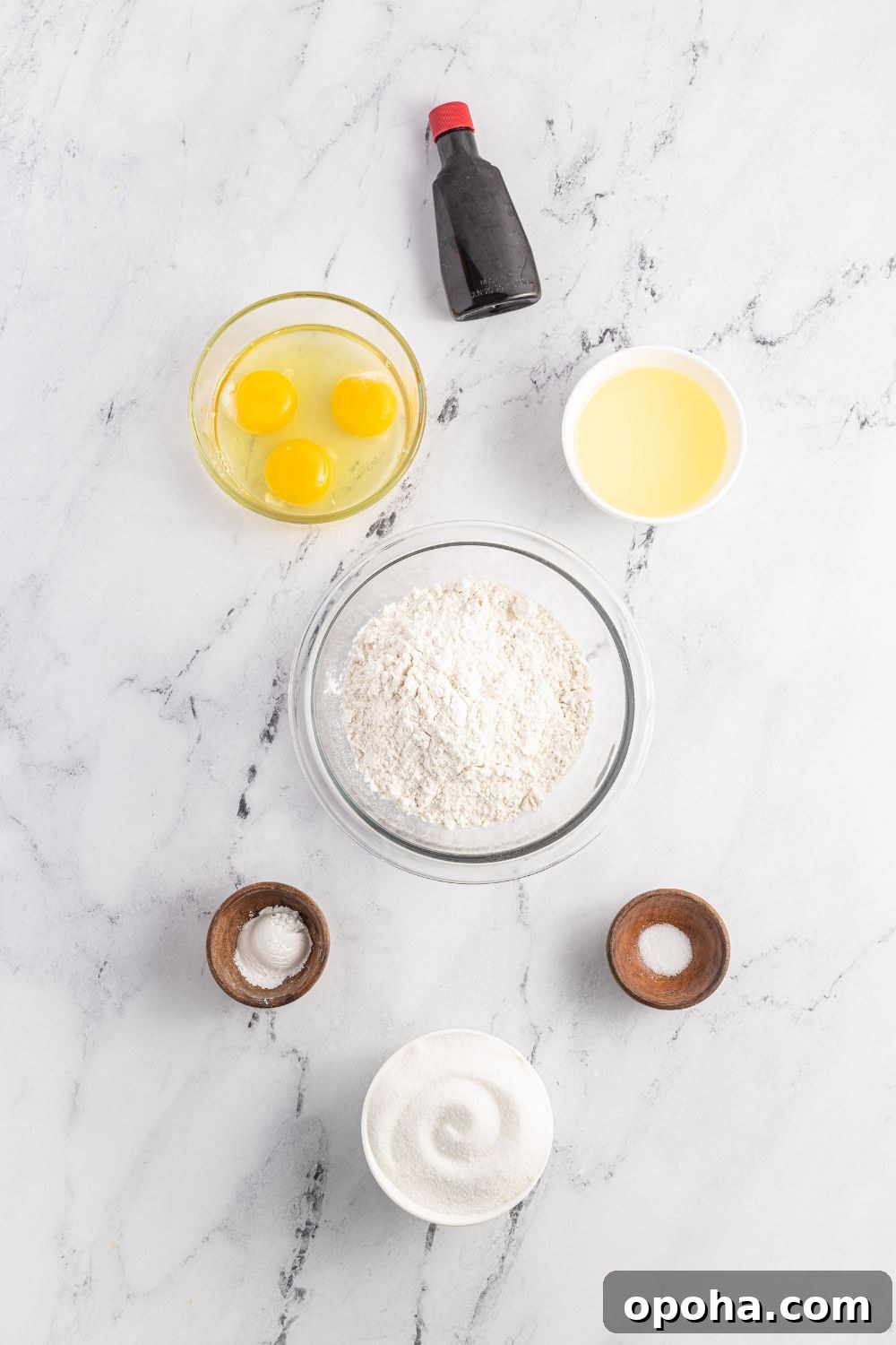 Traditional Italian Pizzelle Cookies: Crisp Anise Wafers Recipe 6 ingredients to make Pizzelles cookies on a marble counter