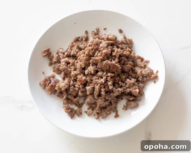 Overnight Crockpot Breakfast Casserole for Busy Mornings 4 browned sausage