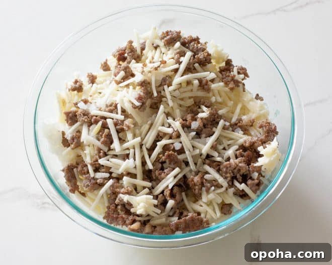 Overnight Crockpot Breakfast Casserole for Busy Mornings 5 potatoes and sausage