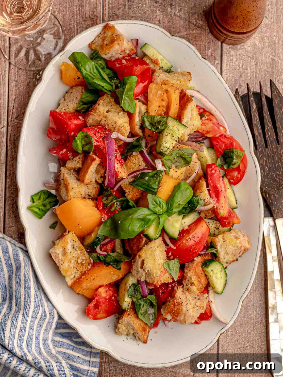 Tuscan Panzanella Salad: Classic Bread & Tomato Recipe 2 Panzanella toscana topped with basil.