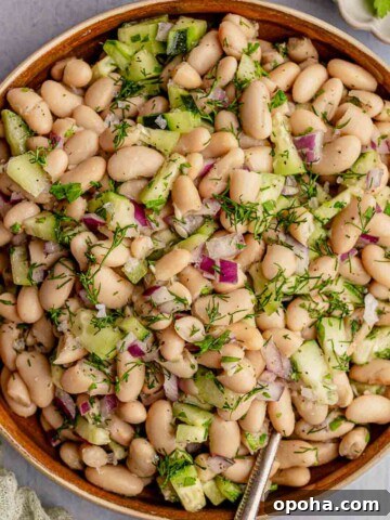 A bowl of cannellini bean salad.