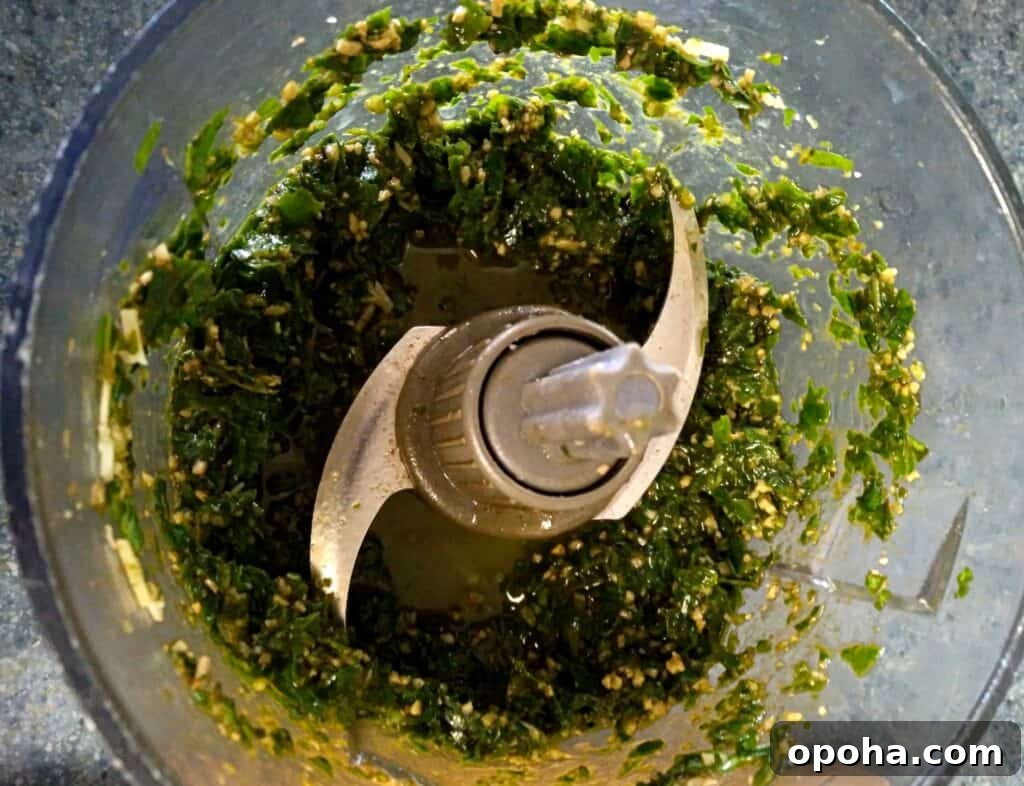 Freeze Fresh Basil in Ice Cube Trays: Step-by-Step Guide 3 Basil chopped with my Ninja chopper