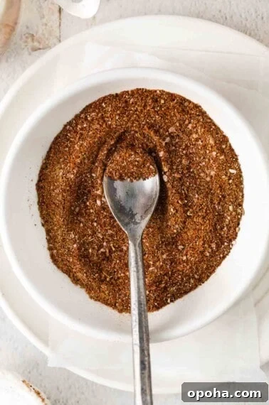 Taco seasoning in a bowl with a spoon