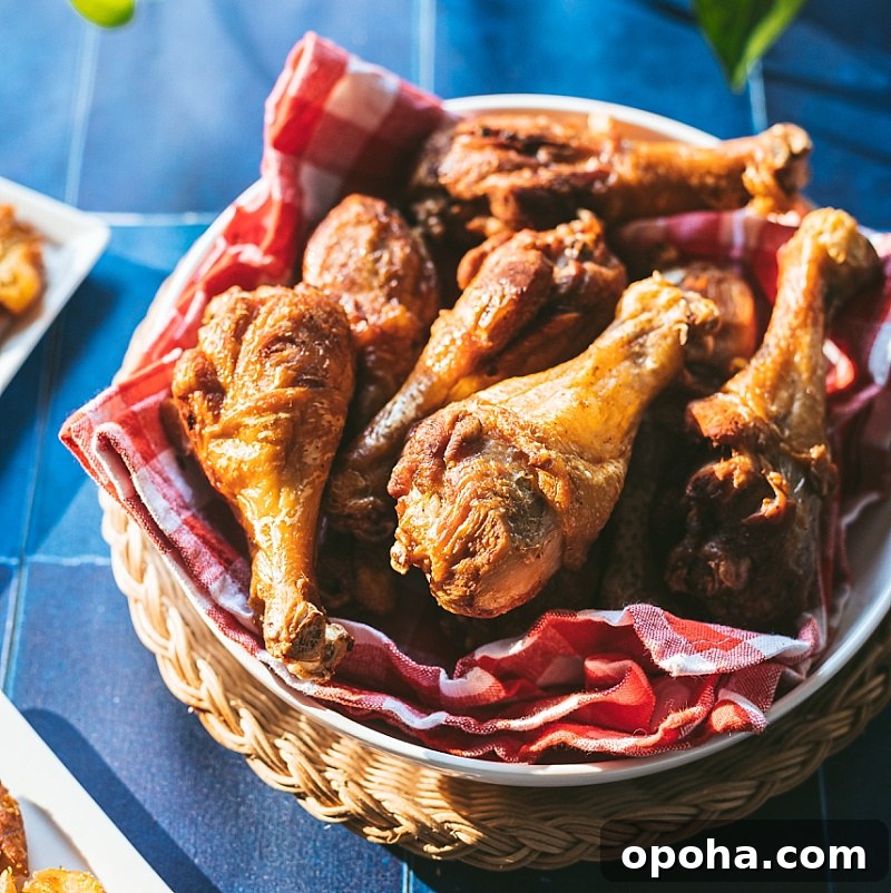 pollo frito puerto rican fried chicken with no flour in basket lined with red checked napkin