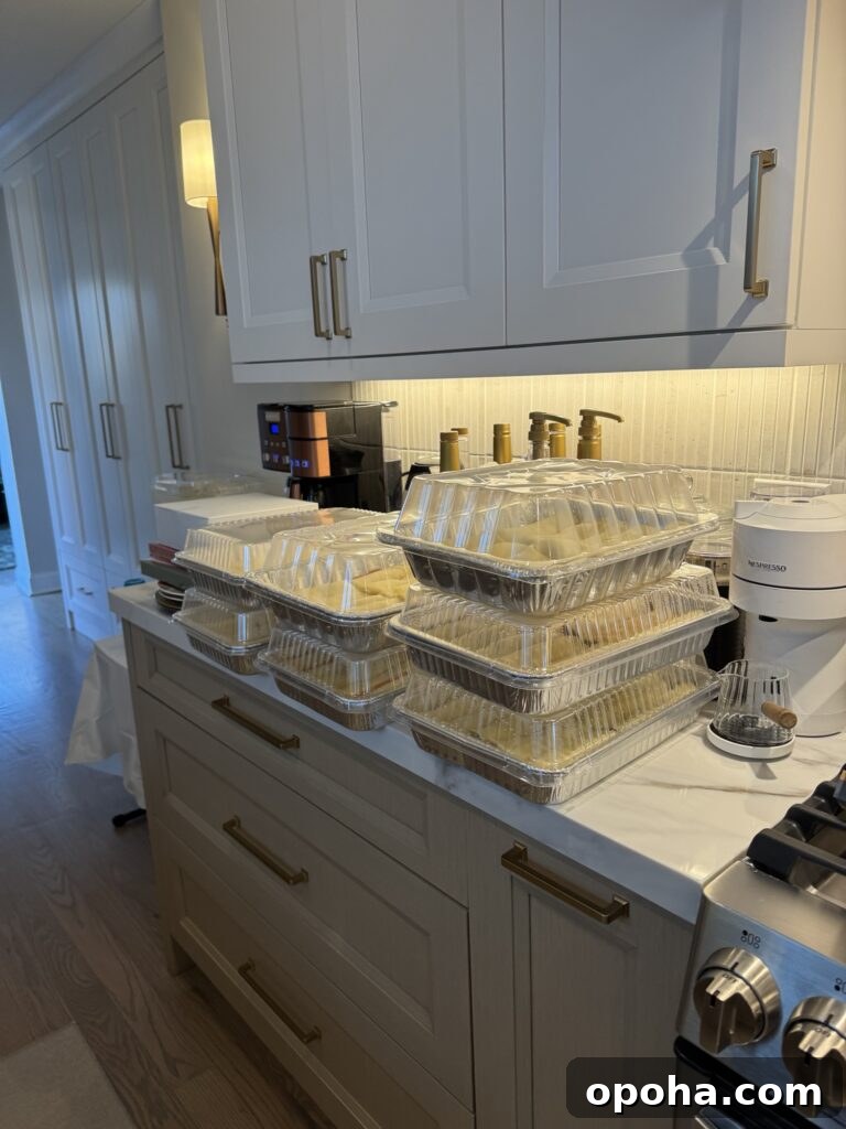 Crepe-Style Manicotti Recipe: Light Italian Stuffed Crepes 4 Seven covered pans of manicotti on the counter