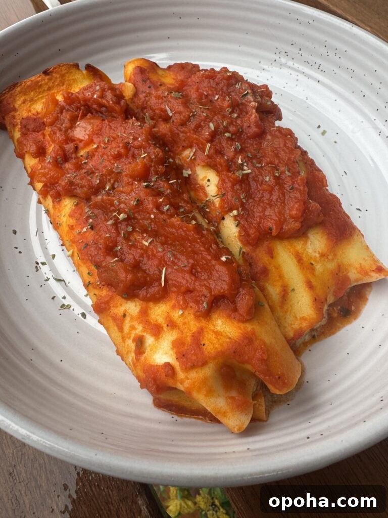 Crepe-Style Manicotti Recipe: Light Italian Stuffed Crepes 7 Two pieces of the finished manicotti