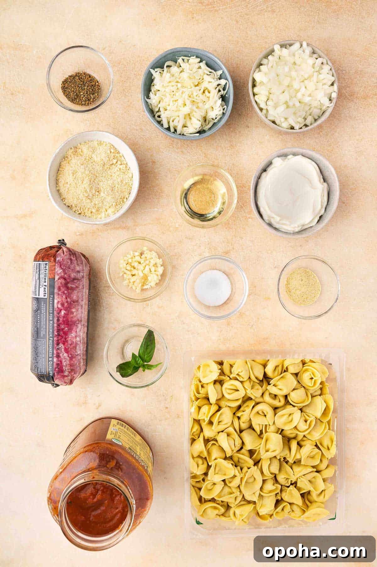 Tortellini Lasagna Bake: Cheesy Italian Pasta Casserole Recipe 3 Ingredients needed to make tortellini lasagna.