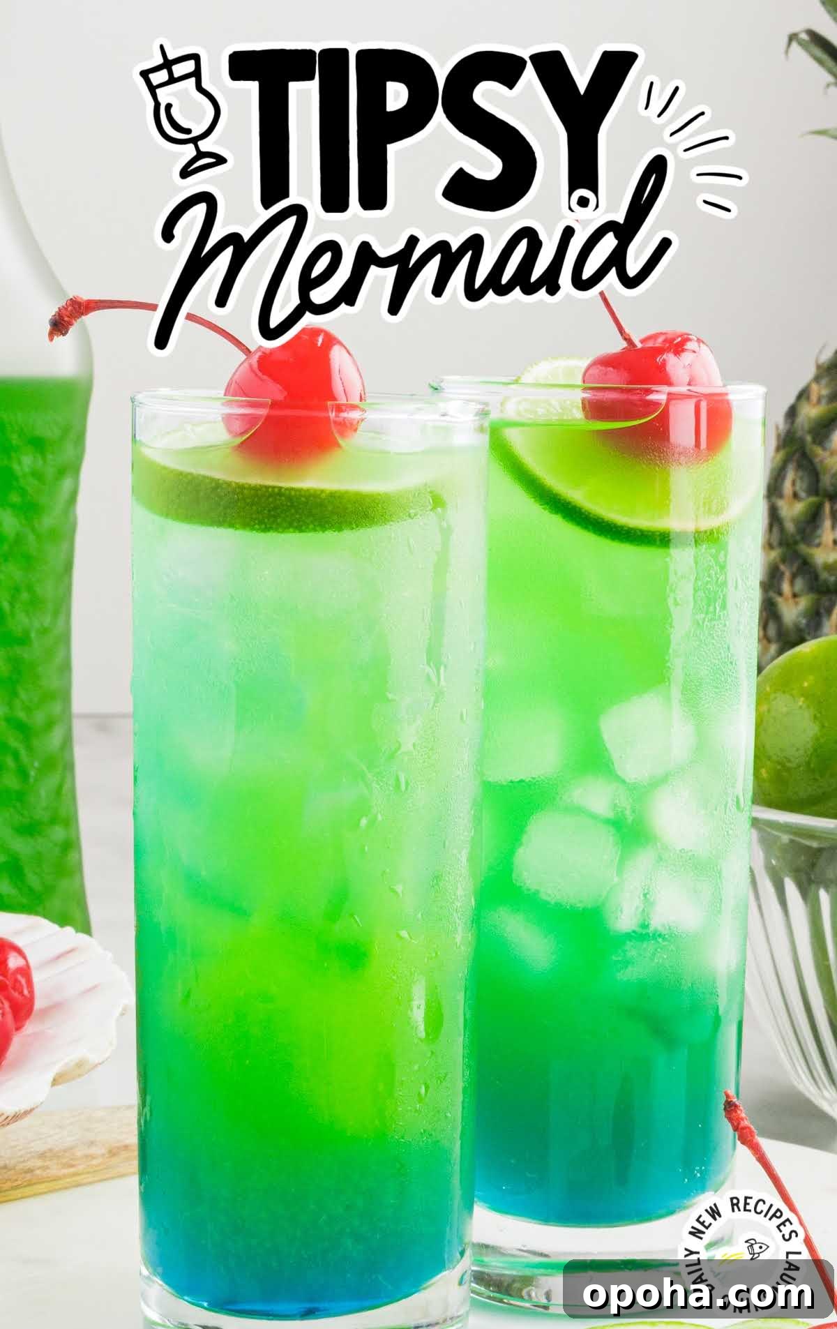 close up shot of Tipsy Mermaids topped with cherry and lime