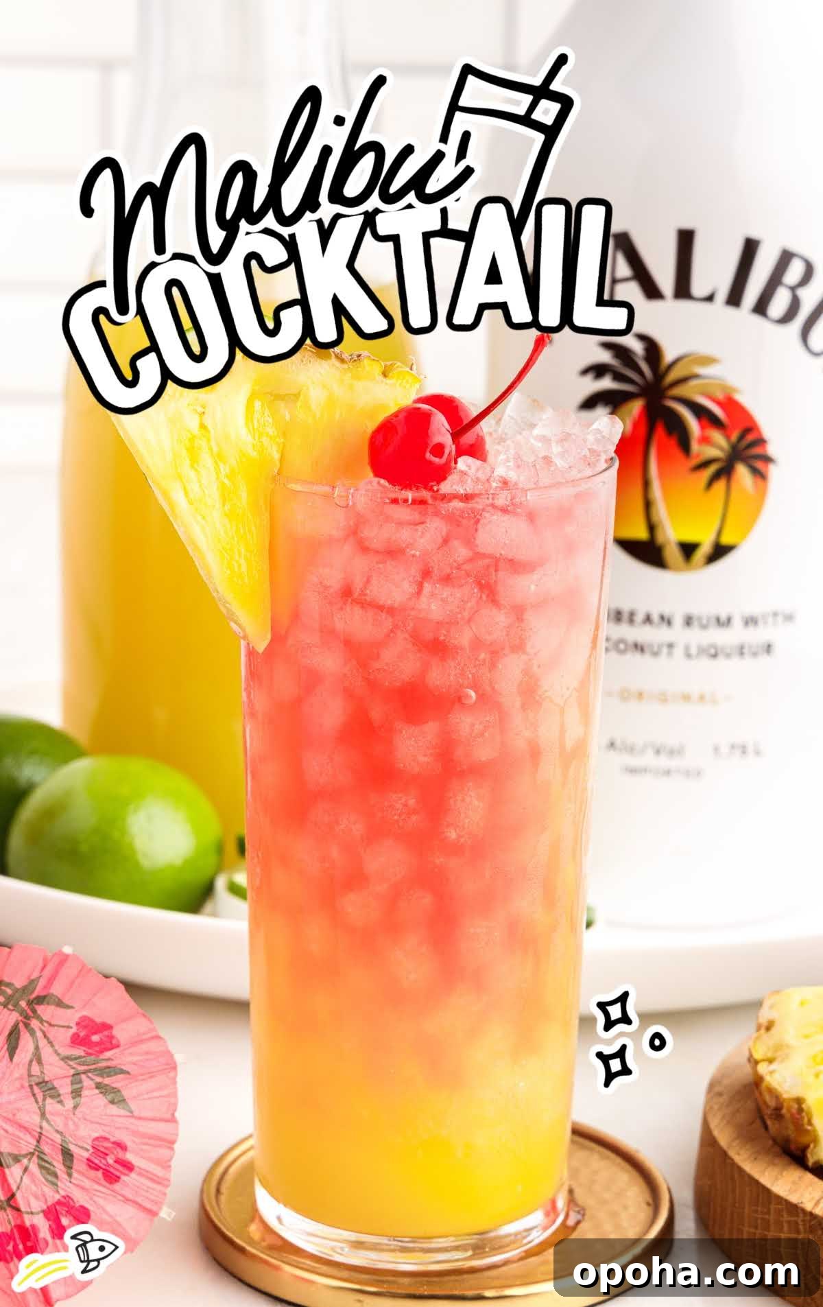 a close up shot of Malibu Cocktail garnished with a cherry, sliced pineapple, and a slice of lime