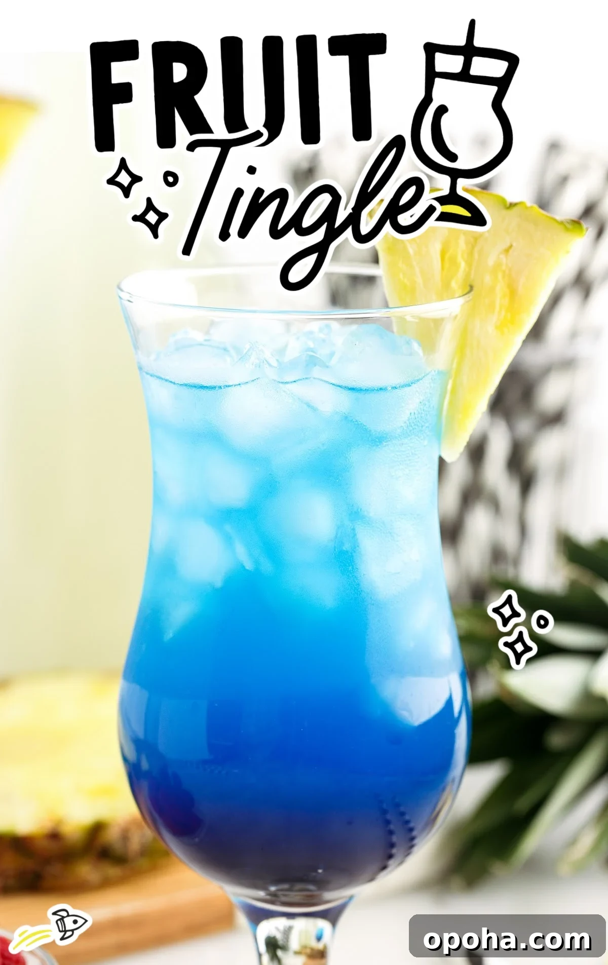 A class of Fruit Tingle cocktail garnished with pineapple. 