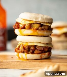 2 potato sandwiches stacked on each other on chopping board