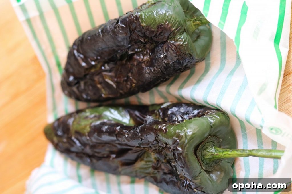 How to Roast Chiles at Home: Simple Steps for Smoky Flavor 9 roasted poblanos ready to peel