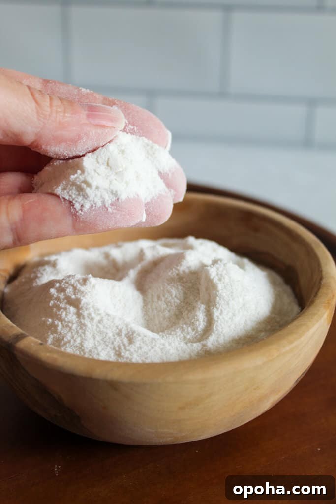 hand holding rice flour.