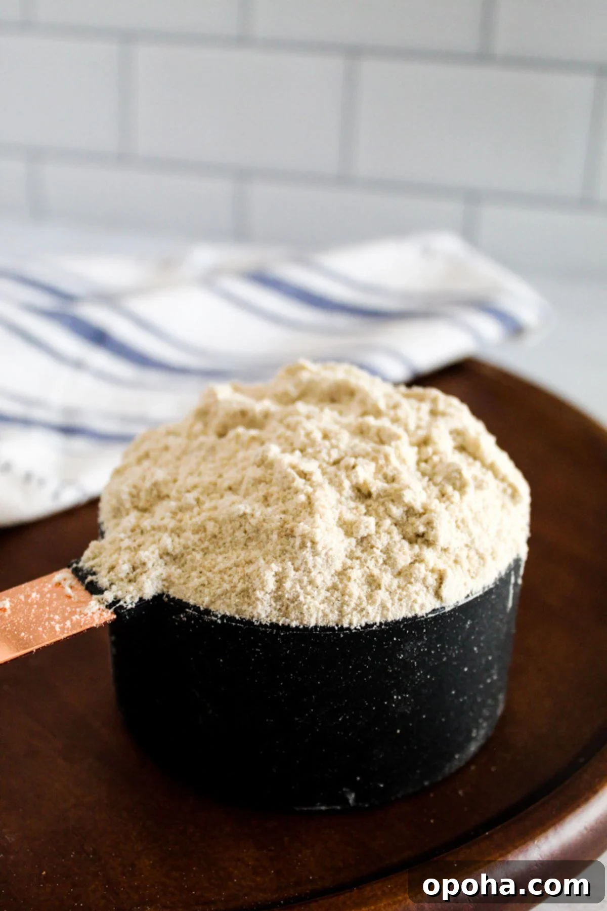 measuring cup of sorghum flour