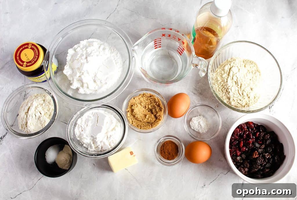 ingredients for gluten free hot cross buns on a white countertop