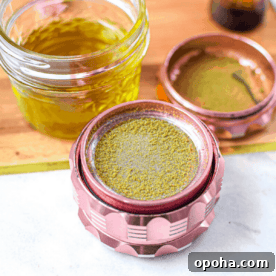 How to Decarb Kief and Make Potent Edibles 4 A picture of cannabis kief in a pink grinder.