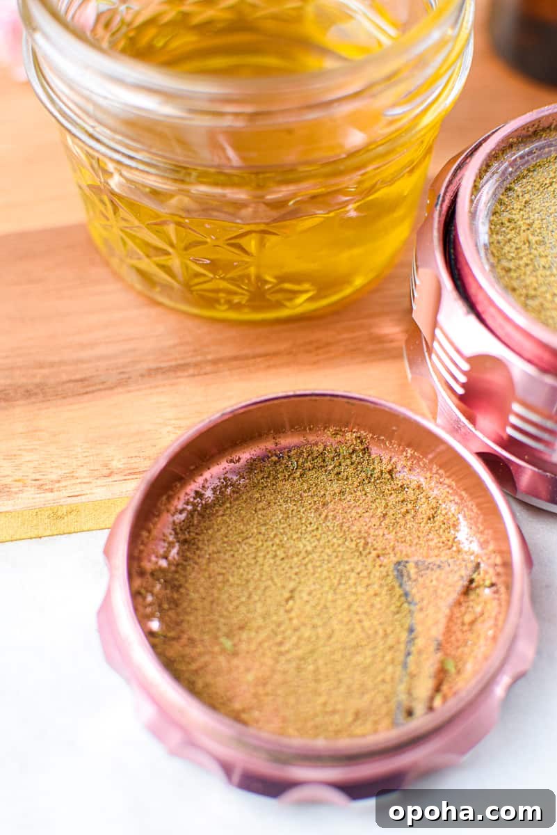 How to Decarb Kief and Make Potent Edibles 8 A picture of cannabis kief in a pink grinder.