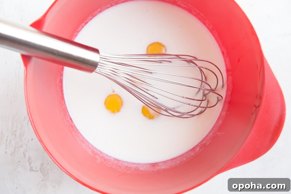 Moist Fluffy Keto Pancakes Made with Coconut Flour 6 Whisk together the liquids for the pancakes in a mixing bowl