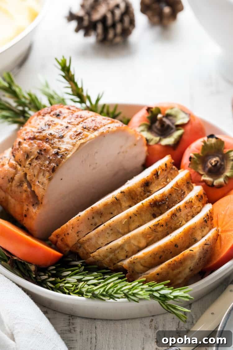 Perfectly Roasted Boneless Turkey Breast Recipe for Juicy Slices 3 Roasted boneless turkey breast, sliced.