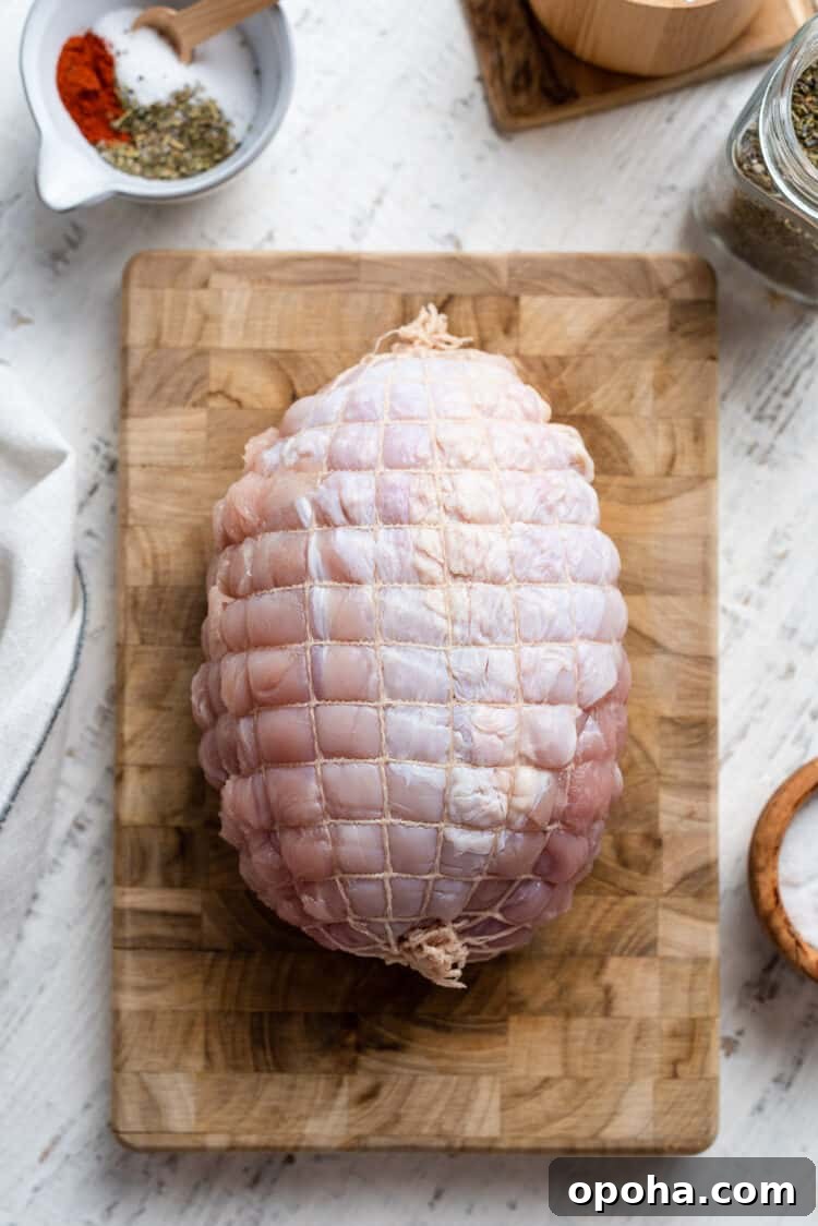 Perfectly Roasted Boneless Turkey Breast Recipe for Juicy Slices 4 boneless turkey breast on a cutting board