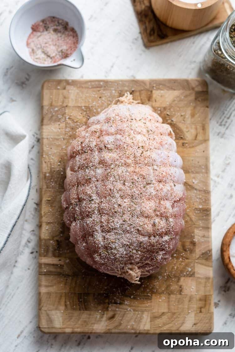 Perfectly Roasted Boneless Turkey Breast Recipe for Juicy Slices 6 boneless turkey breast on a cutting board with seasoning