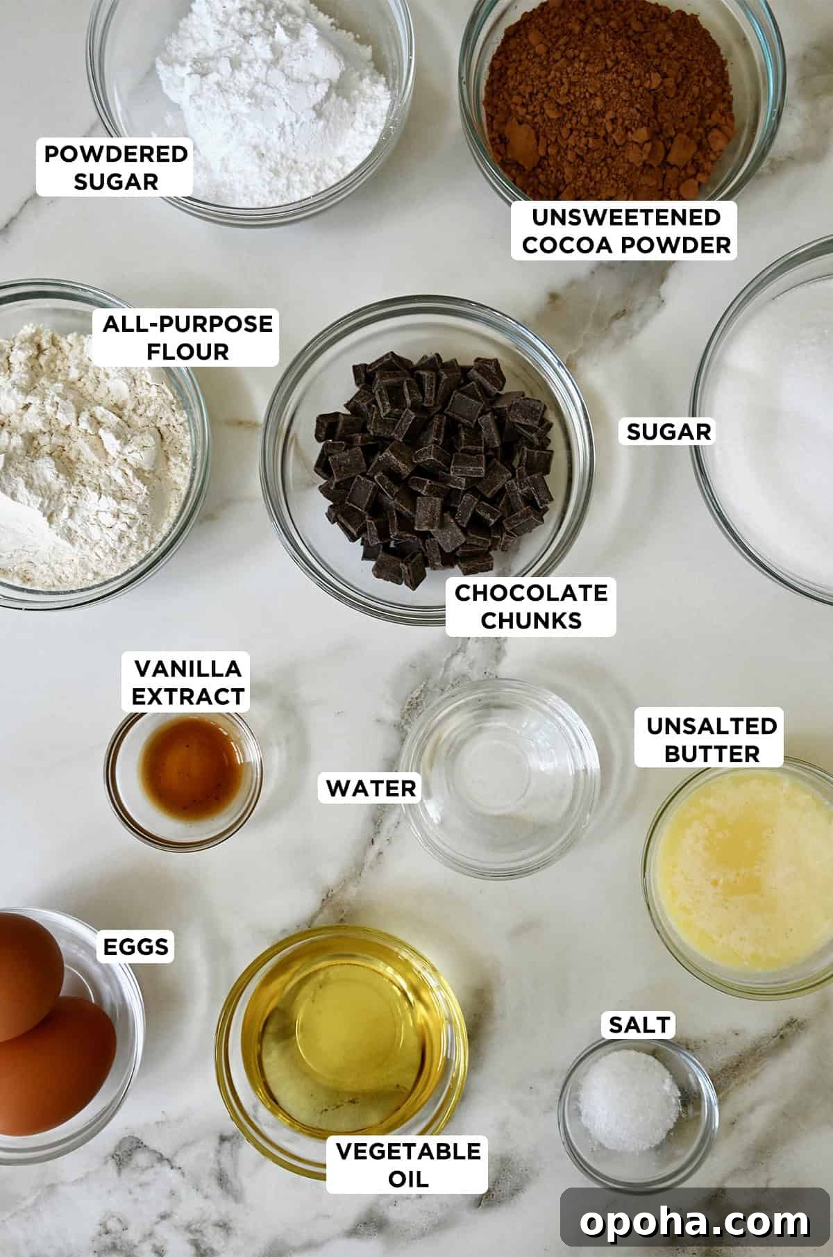 Fudgy From-Scratch Brownie Cupcakes Recipe 3 Ingredients for cocoa powder brownies in various sizes of glass bowls.