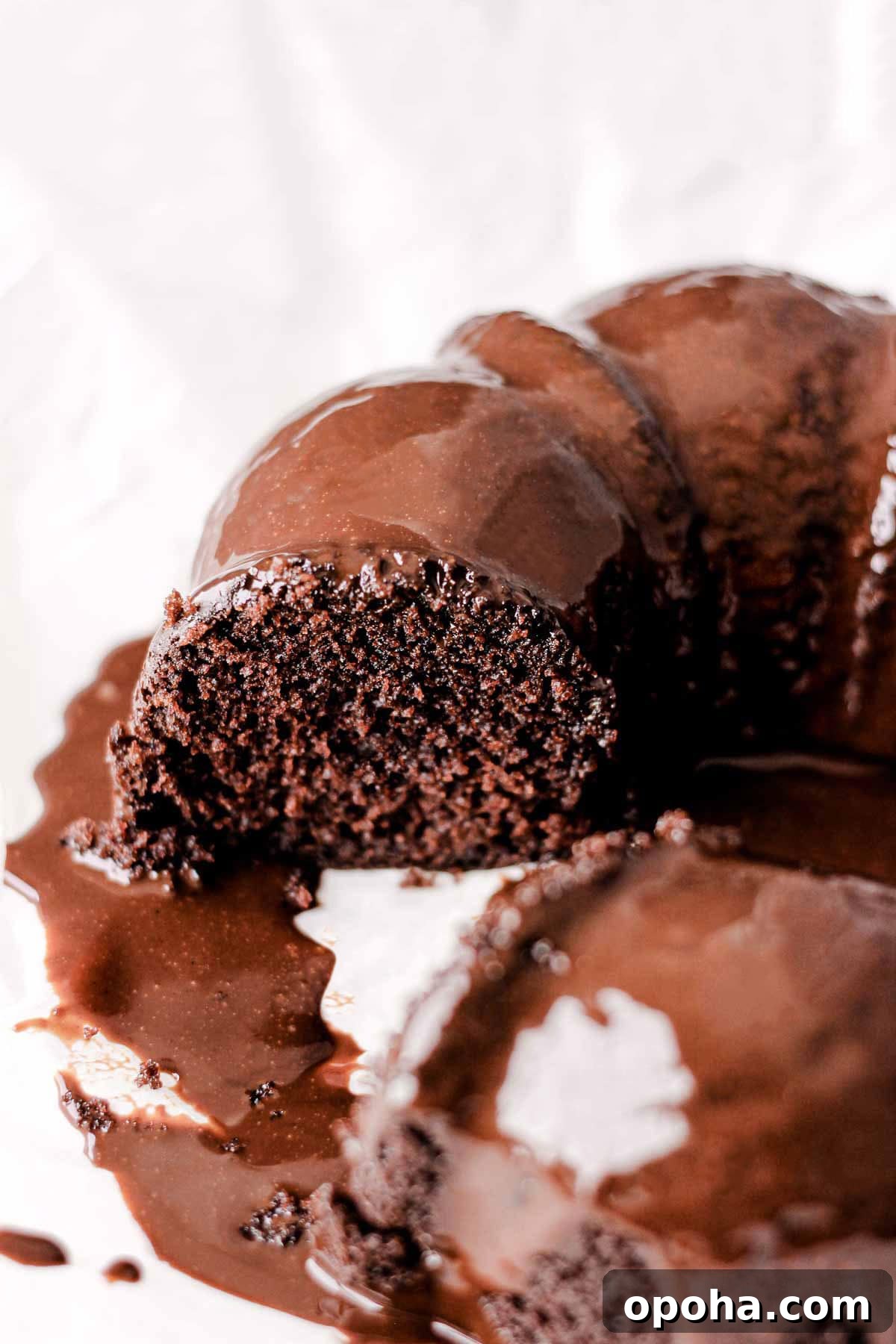 Decadent Chocolate and Peanut Butter Bundt Cake Recipe 7 chocolate glazed chocolate bundt cake on parchment paper