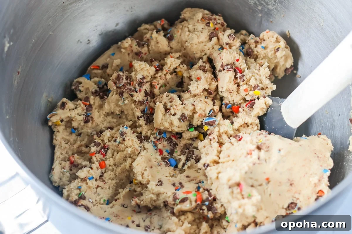 Crushed M&Ms mixed through out cookie dough.