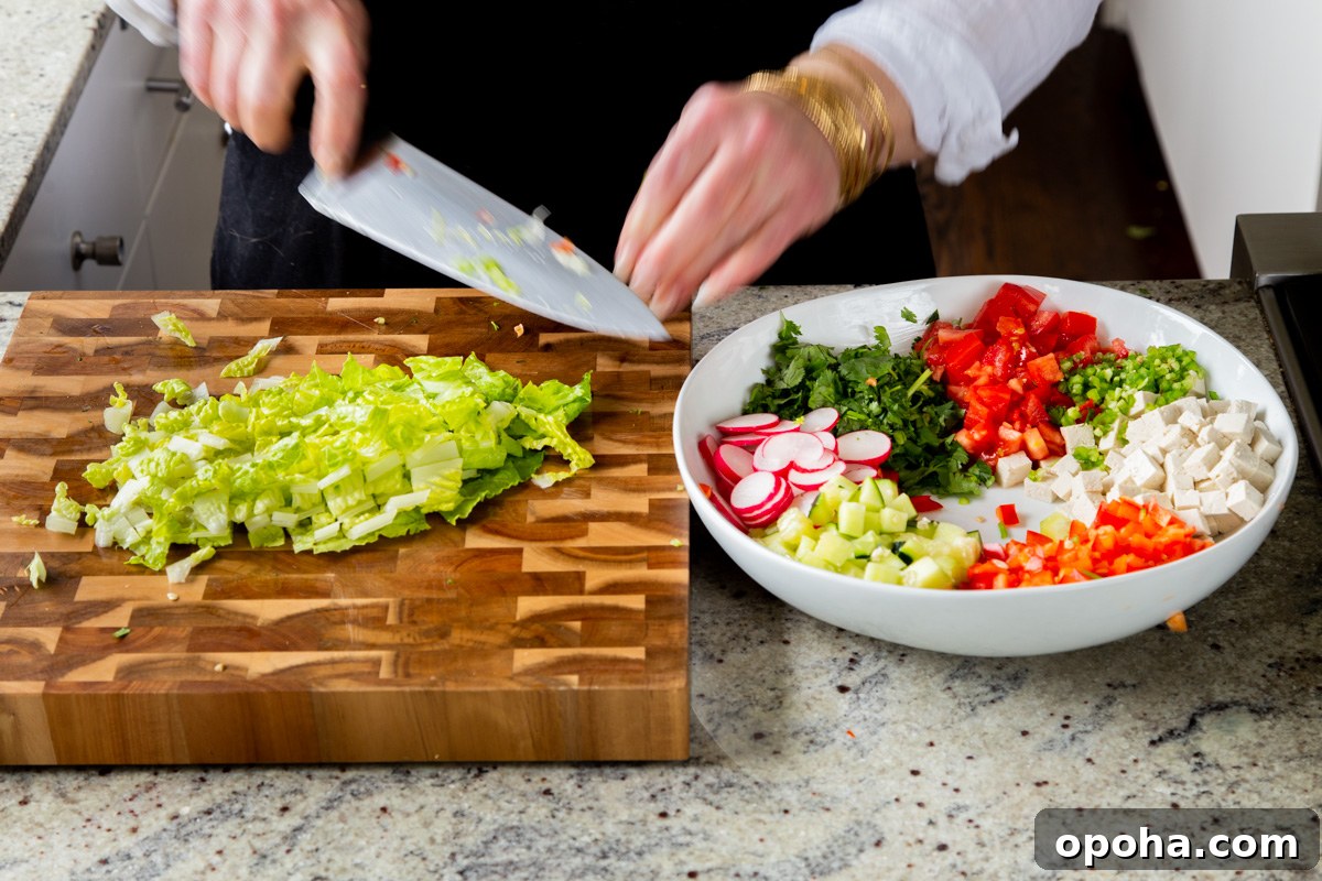 chopping the lettuce