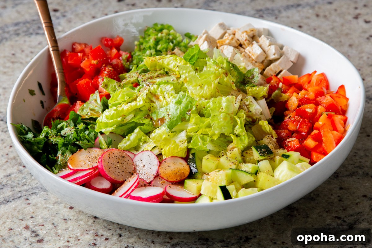 tofu, cilantro, and veggies in the mixing bowl before mixing