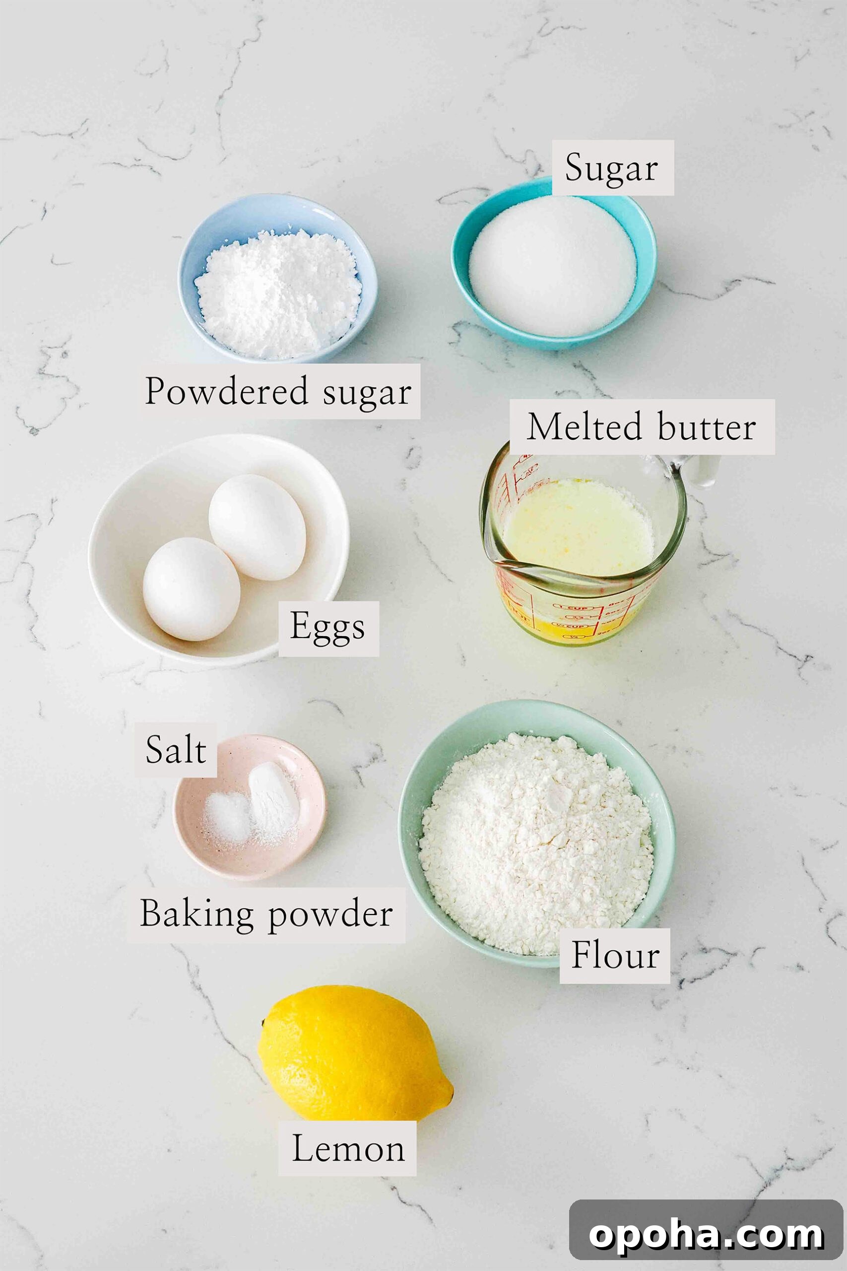 Zesty Lemon Madeleines: Classic French Tea Cakes Recipe 3 Ingredients for lemon madeleines on a quartz counter.