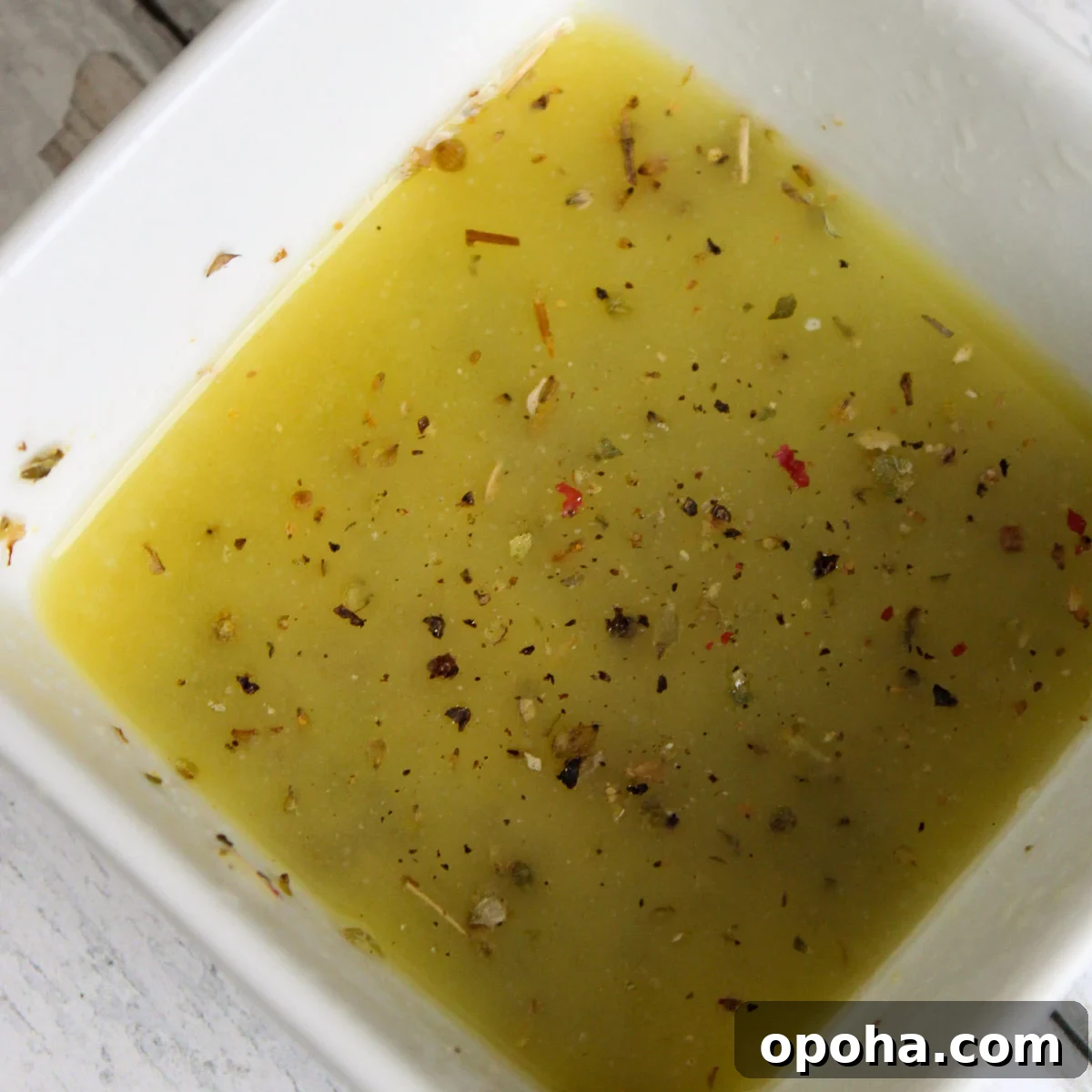 Crispy Air Fryer Smashed Potatoes Recipe 5 Melted butter mixed with parmesan cheese, garlic salt, dried oregano, and a dash of black pepper.
